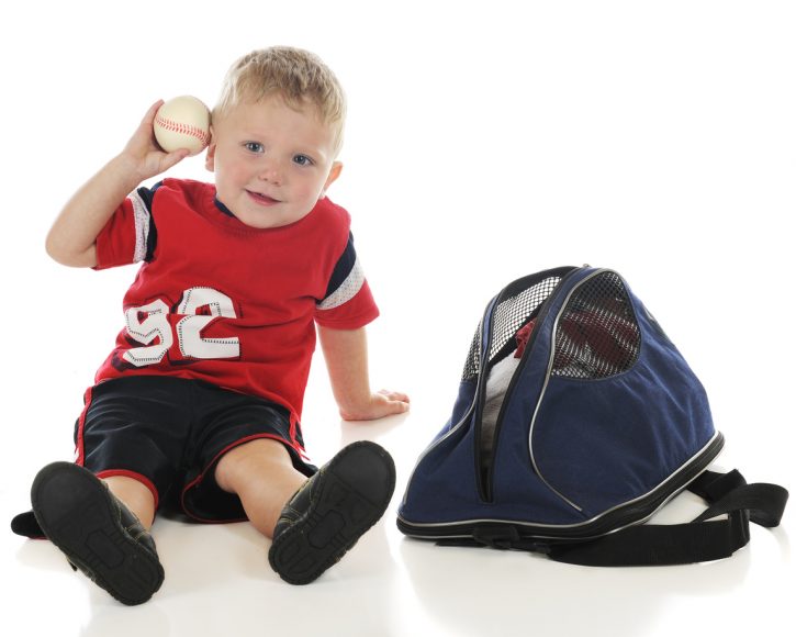 boy with baseball and gym bag